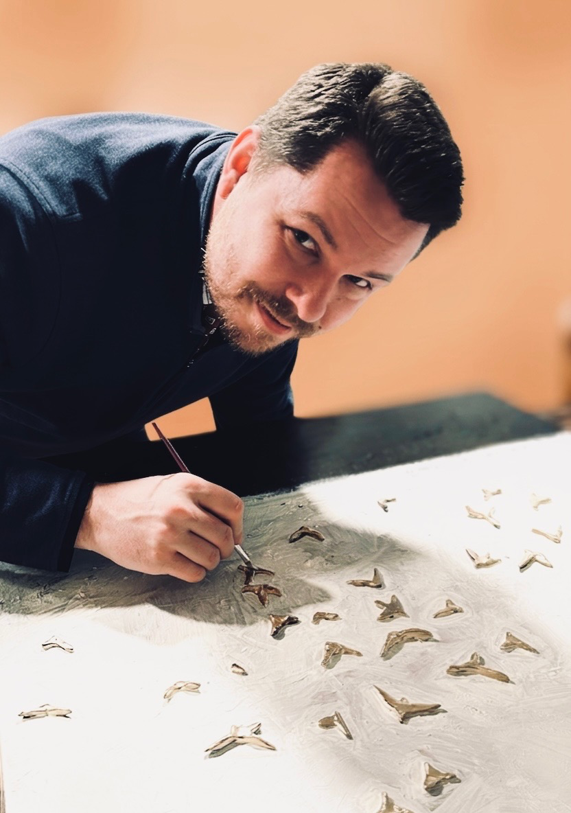 Preston Flynt painting in his studio
